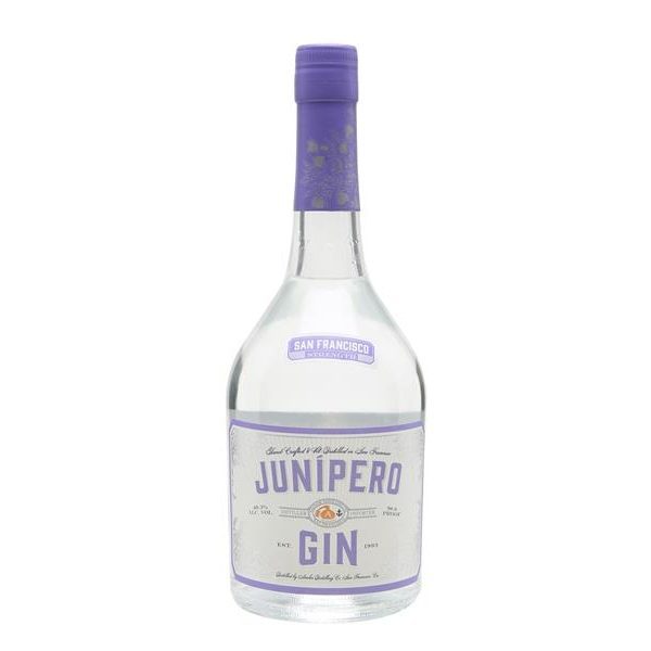A clear glass rounded bottle of Junipero Gin featuring a white and violet label and violet lid