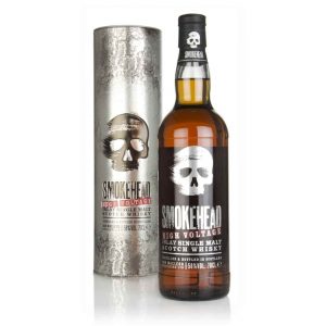 A clear glass bottle of Smokehead High Voltage islay single malt scotch whisky ane silver presentation box featuring the classic skull logo.