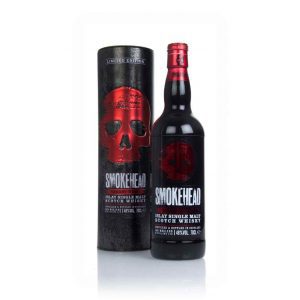 A matte black glass bottle of Smokehead Sherry Bomb islay single malt scotch whisky and black presentation box featuring the classic skull logo in blood red