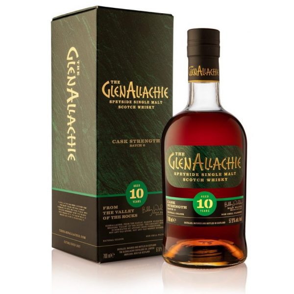 A clear glass rounded bottle of GlenAllachie ten year old cask strength batch six whisky and green presentation box with gold lettering