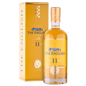 A clear glass rounded bottle of The English Whisky company 11 year old whisky, with a gold lid and bright yellow presentation box.