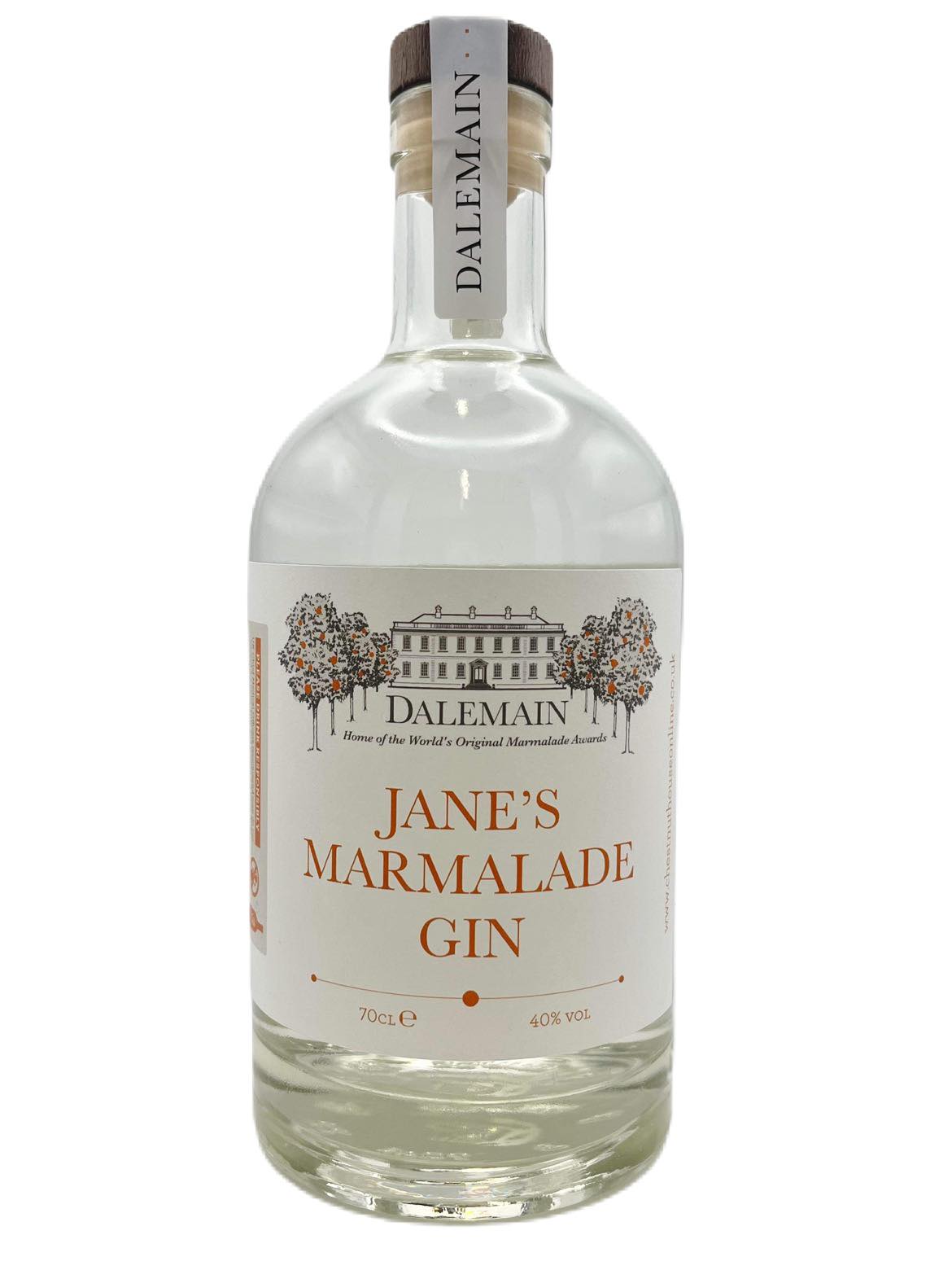 A clear glass bottle of Dalemain Jane's Marmalade Gin. The bottle's label features a manor house lined with orange trees.